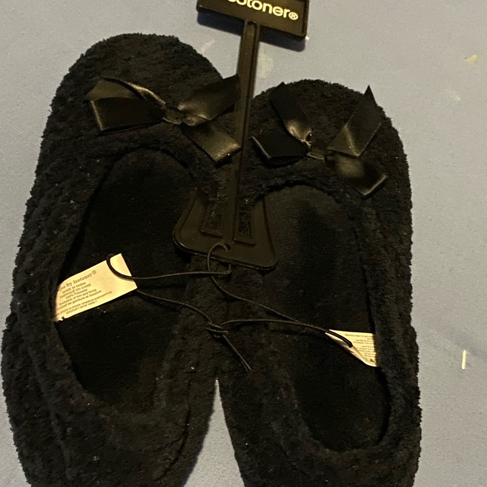 Isotoner Women's Cozy Black Slippers with Bow